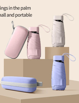 A solid color umbrella with a capsule box and a foldable umbrella for easy travel The umbrella is suitable for both sunny and r