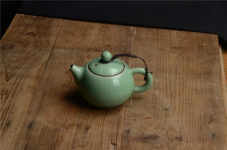 Longan celadon, small teapot, ice crack glaze, ceramic