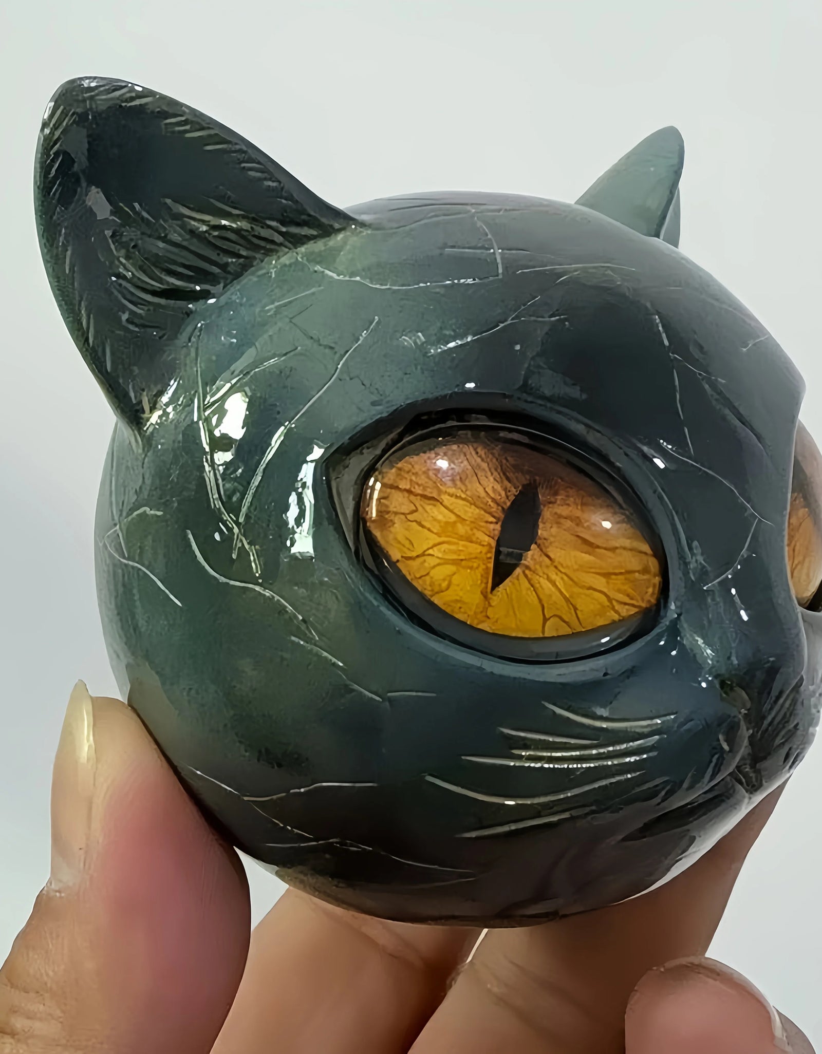Cat Head Statue - Elegant Marble-like Glossy Resin Sculpture with Golden Eyes & Black Marble Texture,Desktop Decor for Home/Offi