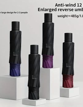 A super large foldable umbrella with black glue and sun protection, reinforced with 12 bones, sturdy for three men and women, su