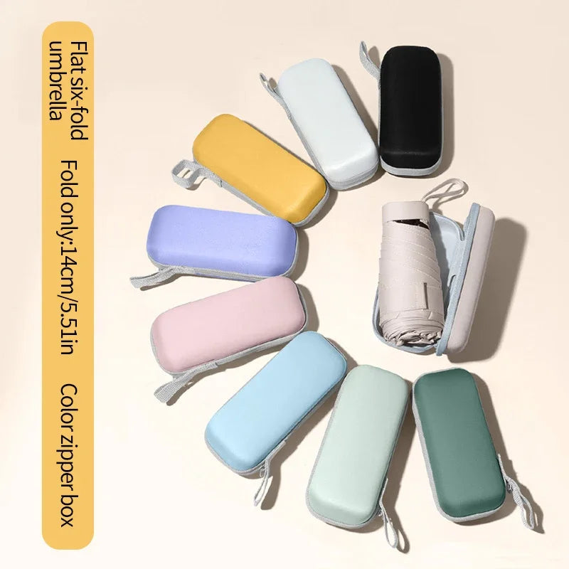 A solid color umbrella with a capsule box and a foldable umbrella for easy travel The umbrella is suitable for both sunny and r