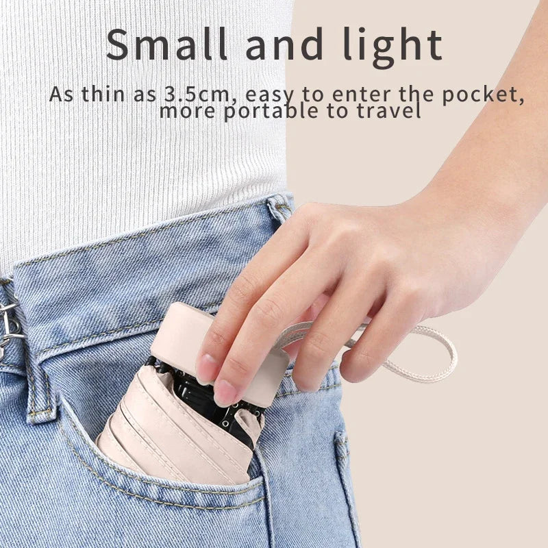 A solid color umbrella with a capsule box and a foldable umbrella for easy travel The umbrella is suitable for both sunny and r