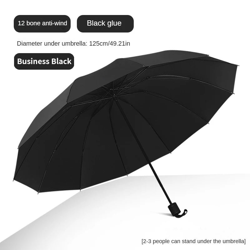 A super large foldable umbrella with black glue and sun protection, reinforced with 12 bones, sturdy for three men and women, su