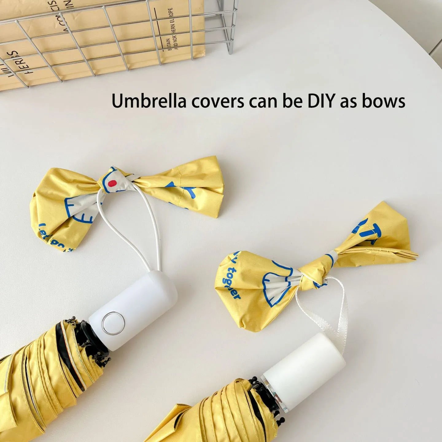 An outdoor travel umbrella with dog prints, mini sun umbrella, sun protection and UV protection