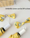 An outdoor travel umbrella with dog prints, mini sun umbrella, sun protection and UV protection