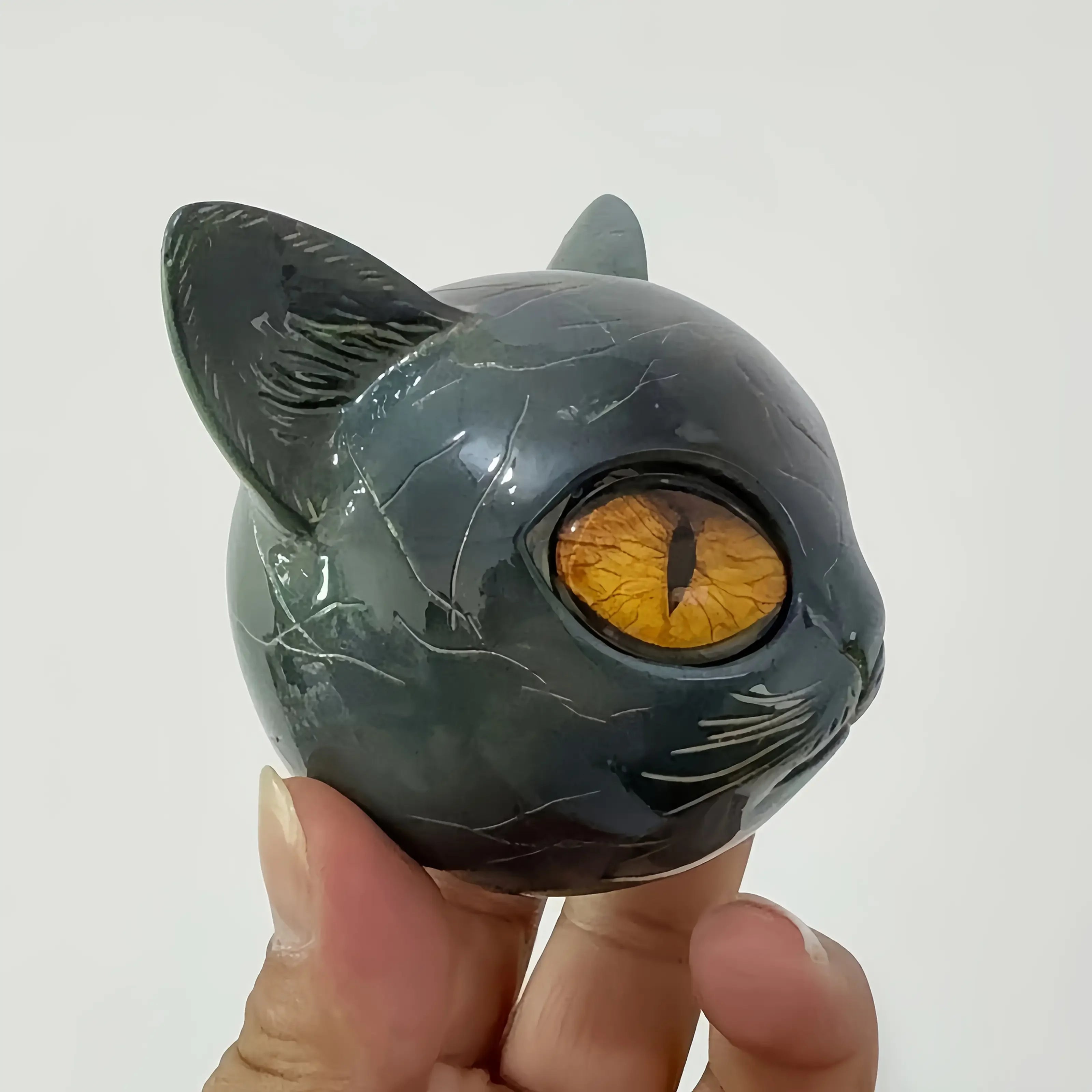 Cat Head Statue - Elegant Marble-like Glossy Resin Sculpture with Golden Eyes & Black Marble Texture,Desktop Decor for Home/Offi