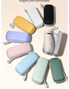 A solid color umbrella with a capsule box and a foldable umbrella for easy travel The umbrella is suitable for both sunny and r