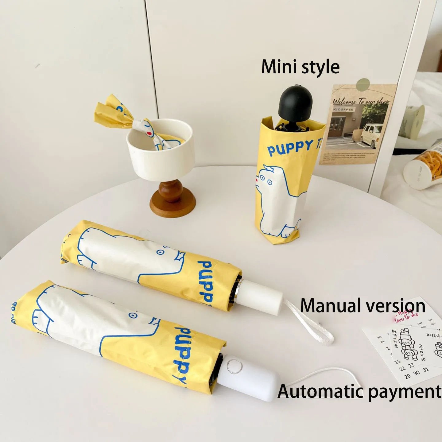 An outdoor travel umbrella with dog prints, mini sun umbrella, sun protection and UV protection