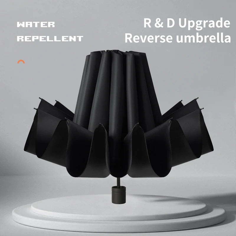 A super large foldable umbrella with black glue and sun protection, reinforced with 12 bones, sturdy for three men and women, su