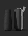 A solid color umbrella with a capsule box and a foldable umbrella for easy travel The umbrella is suitable for both sunny and r